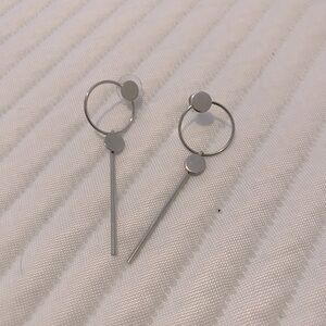 Silver dangle artistic earrings